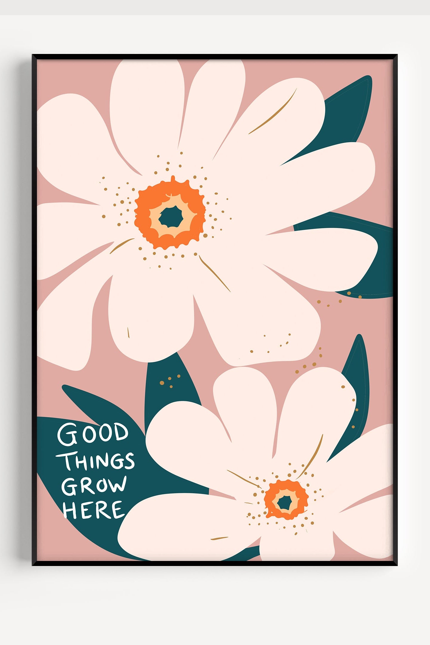 Good Things Grow Here nursery poster with pink floral design displayed in a black frame.